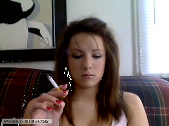 Katie Smokes While Web Surfing - I smoke a cigarette while surfing on the web