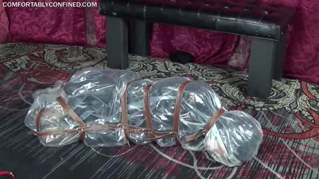 Bagged Down Jacket - Put my slave in my down jacket,then put her in a heavy plastic bag then strapped her up and let her struggle for air,enjoy!!