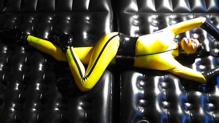 The Yellow Rubber Room - Susan plays with herself in her yellow rubber catsuit in the rubber room !