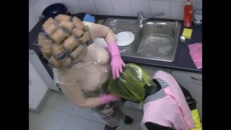 Bizarre Strap On Plastic Housewife