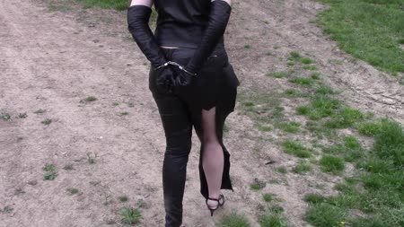 Dirty And Torn Old Leather Pants - Video on demand in the old and damaged leather pants. Interesting contrast with my new sandals high heels. First, I have handcuffs in the back, then the front and chains around his ankles. Blindfolded and gagged.