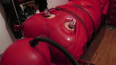 Estim In Inflatable Sleepsack - This slave is in e-stim heaven and hell at the same time. Inflated in the bondage sleepsack by the mistress. Hours of ******* and intense bondage.